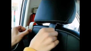 Крючок на подголовник автомобиля