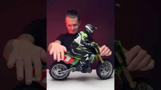 Losi Promoto 1/4 RC dirt bike with battery & charger. Realistic, stable, & powerful. Test drive soon