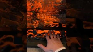 Demonstrating my new electric fireplace. Looks SO REAL even up close. Dimplex Revillusion (RBF30-GP)
