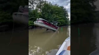 Pontoon Boat hits big rock
